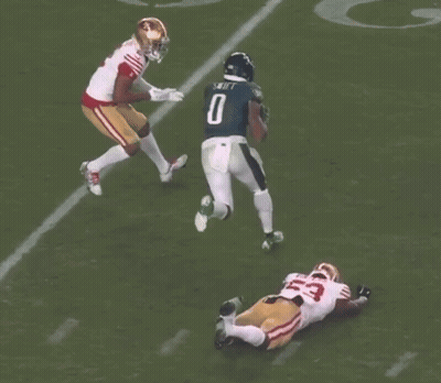 Football Player Number 2 Being Tackled GIF