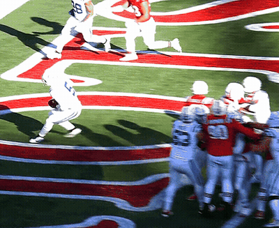 Football Player Number 20 Being Tackled GIF