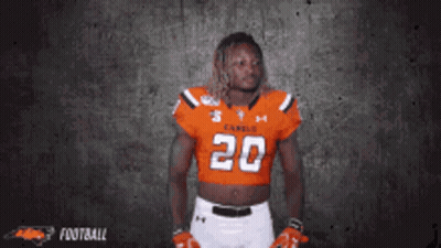Football Player Number 20 Holding Football GIF