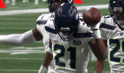 Football Player Number 21 Holding Football GIF