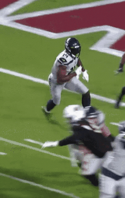 Football Player Number 21 Running On Field GIF