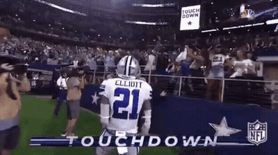 Football Player Number 21 Standing On Field GIF