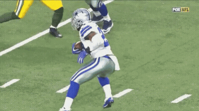 Football Player Number 21 Tackled By Packers Player GIF