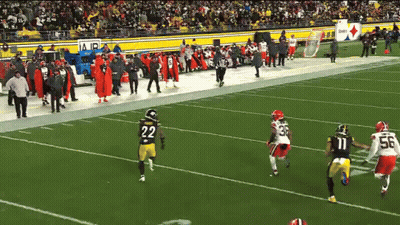 Football Player Number 22 Running On Field GIF