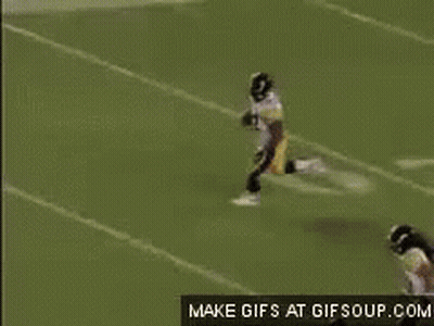 Football Player Number 22 Running On Field GIF