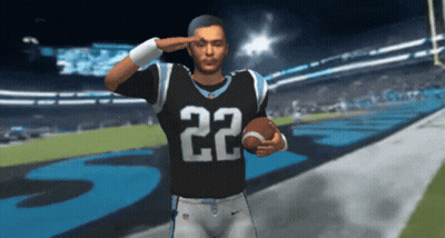 Football Player Number 22 Saluting With Football GIF