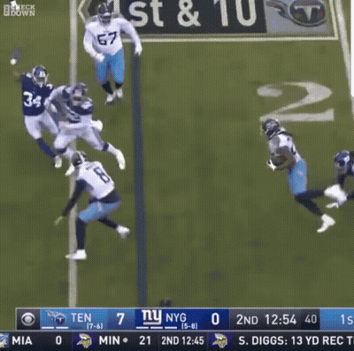 Football Player Number 22 Tackled GIF