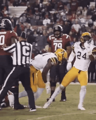 Football Player Number 24 Being Tackled GIF