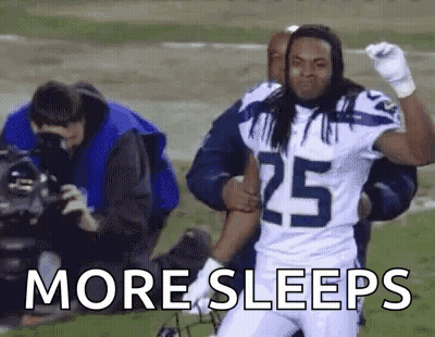 Football Player Number 25 Helped Off Field By Teammate GIF
