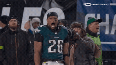 Football Player Number 26 Celebrating