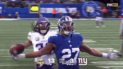 Football Player Number 27 Holding Football GIF