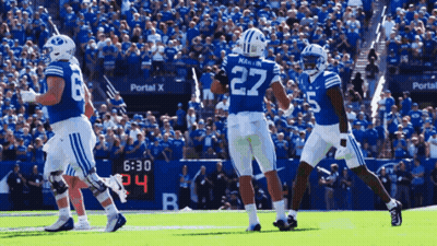 Football Player Number 27 Running GIF