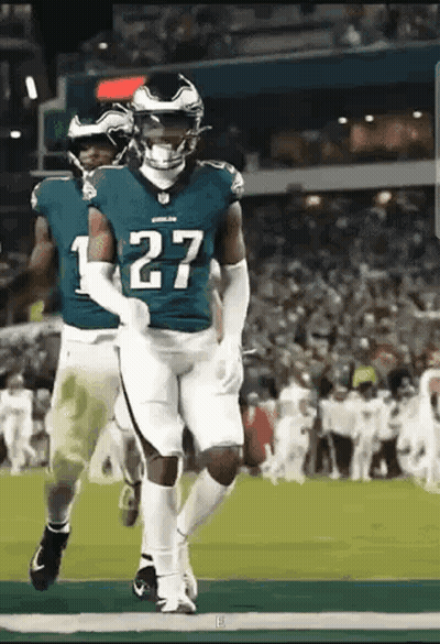 Football Player Number 27 Running GIF