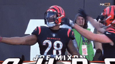 Football Player Number 28 Being Hugged GIF