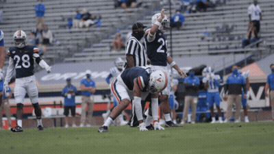 Football Player Number 28 Being Tackled GIF