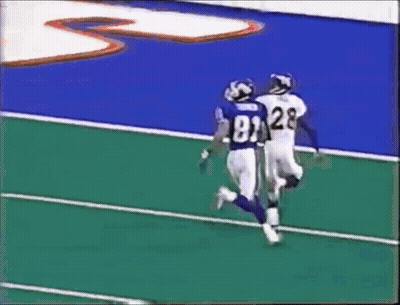 Football Player Number 28 Tackled GIF