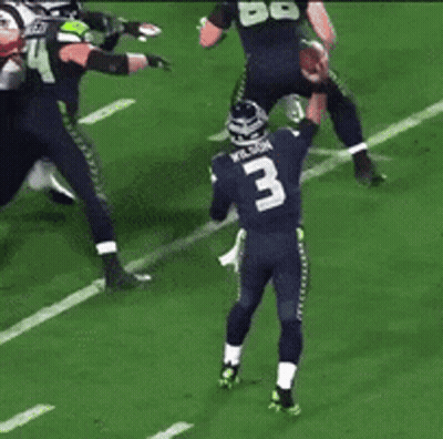 Football Player Number 3 About To Throw Ball GIF
