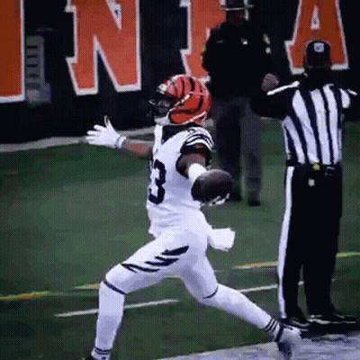 Football Player Number 3 Jumping With Referee GIF