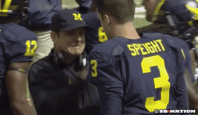 Football Player Number 3 Talking To Another GIF