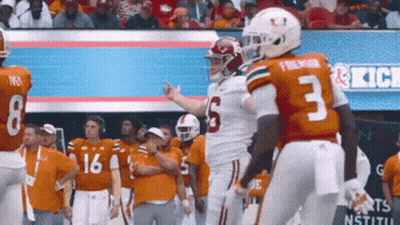 Football Player Number 3 Talking To Another Player GIF