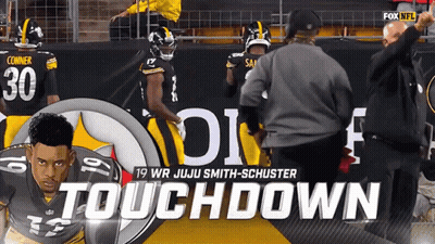 Football Player Number 30 In Front Of Touchdown Wall GIF