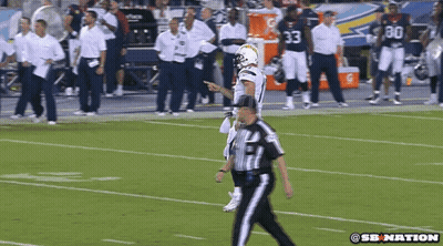 Football Player Number 30 Walking Off Field GIF