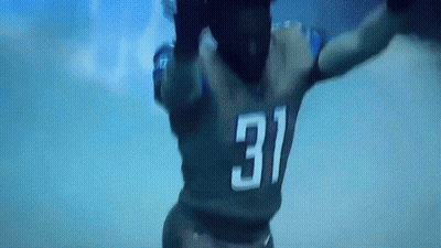 Football Player Number 31 Jumping GIF