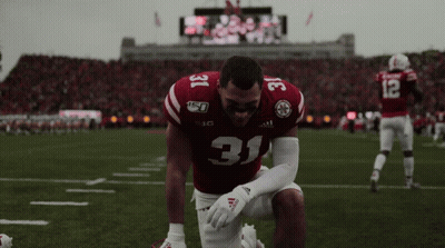 Football Player Number 31 Kneeling GIF