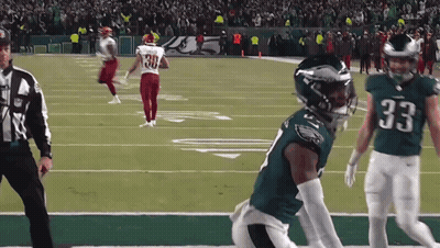 Football Player Number 33 Running On Field GIF