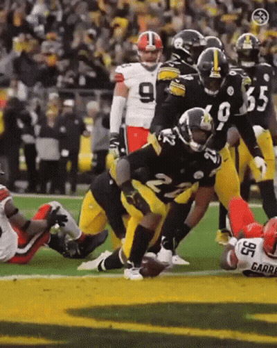 Football Player Number 35 Being Tackled GIF