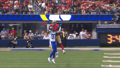 Football Player Number 35 Catching Ball GIF