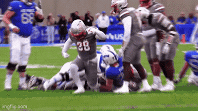 Football Player Number 38 Being Tackled GIF