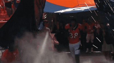 Football Player Number 38 Running Through Tunnel GIF
