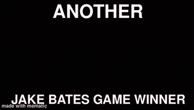 Football Player Number 38 Surrounded By Players GIF