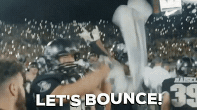 Football Player Number 39 Held Up By Teammates GIF