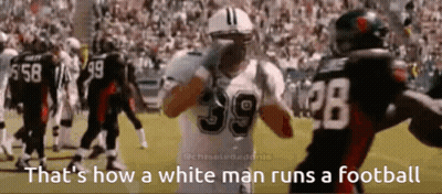 Football Player Number 39 Talking To Another Player GIF