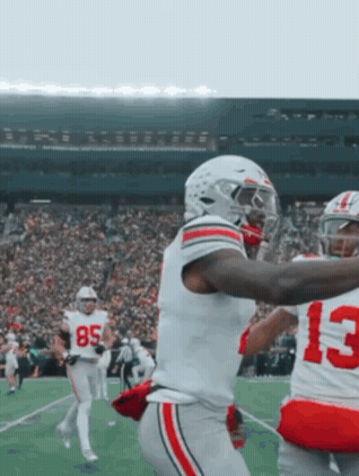 Football Player Number 4 Catching Pass GIF