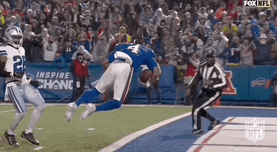 Football Player Number 4 Flying Through Air With Referee Watching GIF