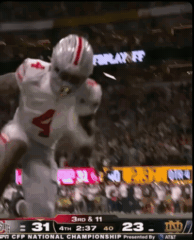 Football Player Number 4 Jumping In Air GIF