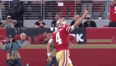 Football Player Number 4 Running On Field GIF