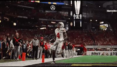 Football Player Number 4 Running On Field GIF