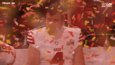 Football Player Number 4 Surrounded By Confetti GIF