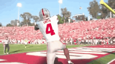 Football Player Number 4 Throwing Ball GIF