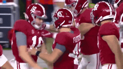 Football Player Number 45 Talking To Another Player GIF