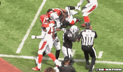 Football Player Number 48 Being Tackled GIF
