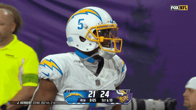 Football Player Number 5 In Front Of Scoreboard GIF