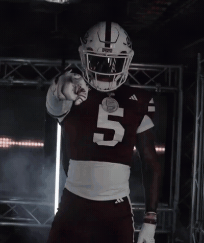 Football Player Number 5 Pointing at Camera