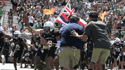 Football Player Number 5 Running Towards Crowd GIF