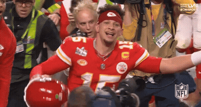 Football Player Number 5 Surrounded By People GIF