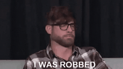 Football Player Number 5 Surrounded By Players GIF